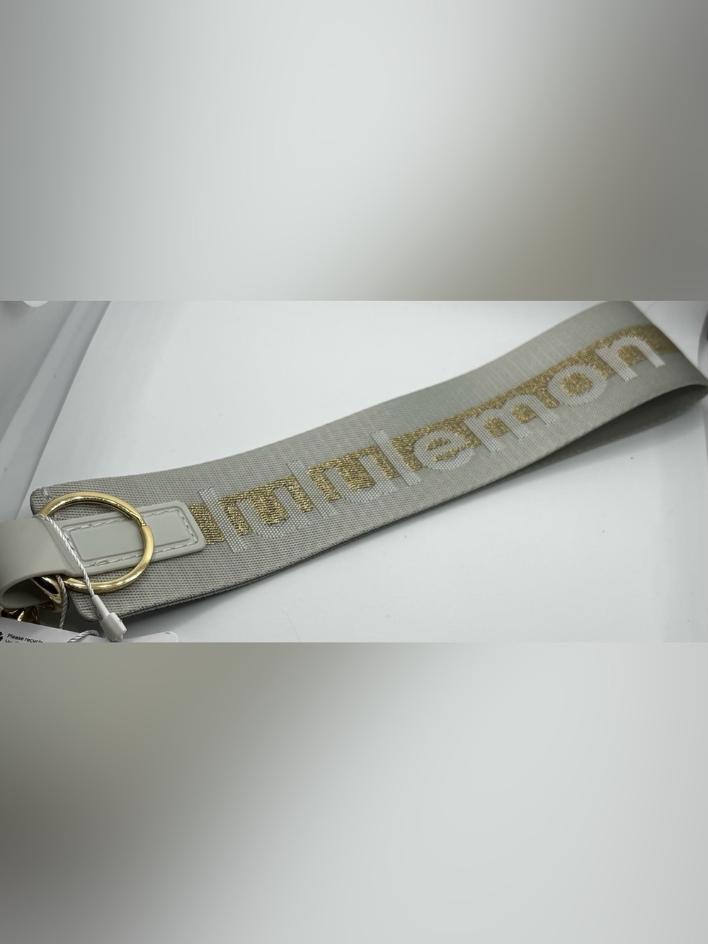 Lululemon Never Lost Keychain Vapor Gold NWT